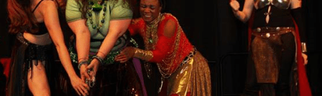 Avengers try to pick up Mjolnir while Thor laughs. Photo by Jennifer Stewart (c)2015