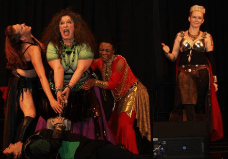 Avengers try to pick up Mjolnir while Thor laughs. Photo by Jennifer Stewart (c)2015